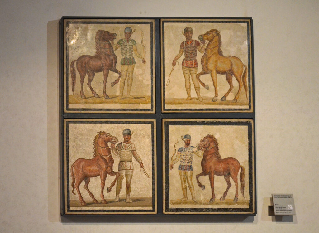 Mosaico de cocheiros com cavalos de cada uma das facções